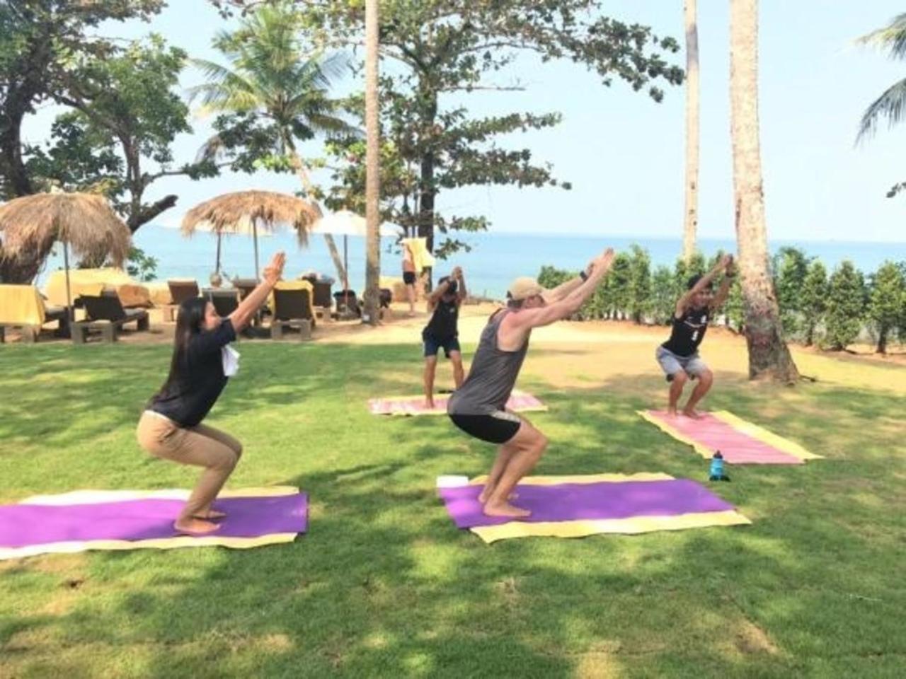 Eden Beach Khaolak Resort And Spa A Lopesan Collection Hotel - Sha Extra Plus Khao Lak Bagian luar foto A yoga class at a resort in Phuket, Thailand